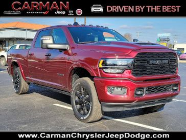 2024 RAM 2500 Limited Crew Cab 4x4 6'4' Box in a Delmonico Red Pearl Coat exterior color and Black - ULX9interior. Carman Chrysler Jeep Dodge Ram 302-317-2378 carmanchryslerjeepdodge.com 