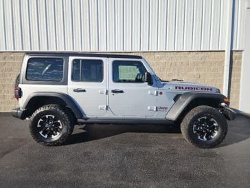 2024 Jeep Wrangler 4-door Rubicon in a Silver Zynith Clear Coat exterior color and Blackinterior. Wilmington Auto Center Chrysler Dodge Jeep Ram (937) 556-6430 wilmingtonautocentercdjr.com 