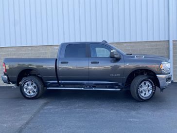 2024 RAM 2500 Big Horn Crew Cab 4x4 6'4' Box in a Granite Crystal Metallic Clear Coat exterior color and Diesel Gray/Blackinterior. Wilmington Auto Center Chrysler Dodge Jeep Ram (937) 556-6430 wilmingtonautocentercdjr.com 