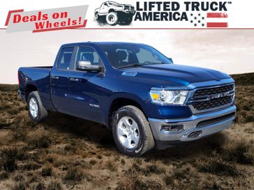 2024 RAM 1500 Big Horn in a Patriot Blue Pearl Coat exterior color and Diesel Gray/Blackinterior. Lifted Truck America 888-267-0644 liftedtruckamerica.com 