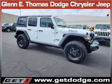 2024 Jeep Wrangler 4-door Willys 4xe in a Bright White Clear Coat exterior color and Blackinterior. Glenn E Thomas 100 Years Of Excellence (866) 340-5075 getdodge.com 