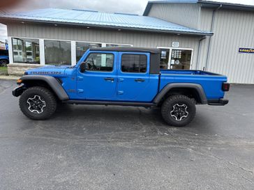 2023 Jeep Gladiator Rubicon 4x4 in a Hydro Blue Pearl Coat exterior color and Blackinterior. Victor Chrysler Dodge Jeep Ram 585-236-4391 victorcdjr.com 
