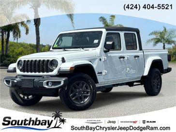New 2026 Jeep Gladiator Sport S 4x4 in a Bright White Clear Coat exterior color and Blackinterior. Southbay Chrysler Jeep Dodge Ram (424) 404-5521 pixelmotiondemo.com 