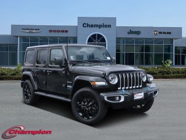 2022 Jeep Wrangler 4xE Unlimited Sahara in a Black Clear Coat exterior color and Blackinterior. Champion Chrysler Jeep Dodge Ram 800-549-1084 pixelmotiondemo.com 