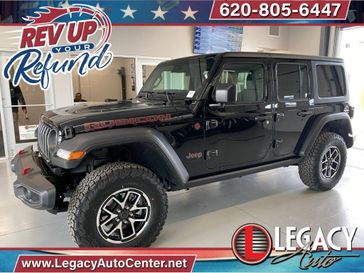 2024 Jeep Wrangler 4-door Rubicon in a Black Clear Coat exterior color and Blackinterior. Legacy Auto Center 620-315-9264 legacyautocenter.net 