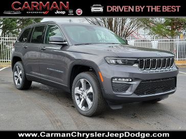 2024 Jeep Grand Cherokee 4xe in a Baltic Gray Metallic Clear Coat exterior color and Global Black - B6X7interior. Carman Chrysler Jeep Dodge Ram 302-317-2378 carmanchryslerjeepdodge.com 