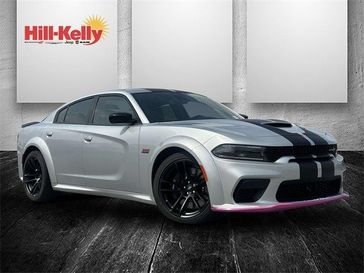 2023 Dodge Charger Scat Pack Widebody in a Triple Nickel exterior color. Hill-Kelly Dodge (850) 786-2130 hillkellydodge.com 