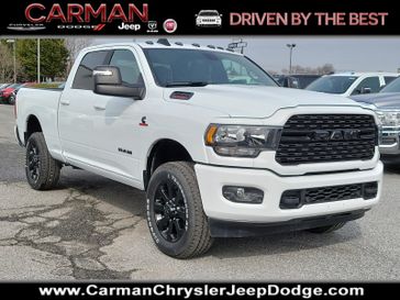 2024 RAM 2500 Big Horn Crew Cab 4x4 6'4' Box in a Bright White Clear Coat exterior color and Blackinterior. Carman Chrysler Jeep Dodge Ram 302-317-2378 carmanchryslerjeepdodge.com 