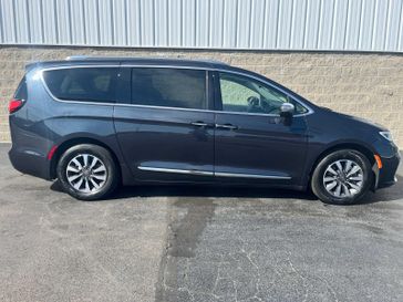 2021 Chrysler Pacifica Hybrid Limited in a Maximum Steel Metallic Clear Coat exterior color and Alloy/Blackinterior. Wilmington Auto Center Chrysler Dodge Jeep Ram (937) 556-6430 wilmingtonautocentercdjr.com 