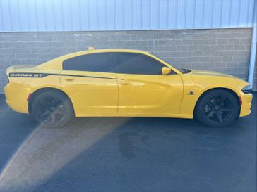 2018 Dodge Charger R/T in a Yellow Jacket Clear Coat exterior color and Blackinterior. Wilmington Auto Center Chrysler Dodge Jeep Ram (937) 556-6430 wilmingtonautocentercdjr.com 