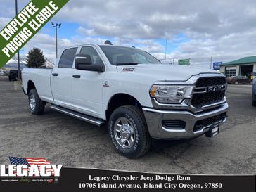 2024 RAM 2500 Tradesman Crew Cab 4x4 8' Box in a Bright White Clear Coat exterior color and Blackinterior. Legacy Chrysler Jeep Dodge RAM 541-663-4885 legacychryslerjeepdodgeram.com 