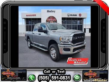 2024 RAM 3500 Tradesman Crew Cab 4x4 6'4' Box in a Billet Silver Metallic Clear Coat exterior color and Blackinterior. Melloy Dodge RAM FIAT 505-588-4459 melloydodge.com 