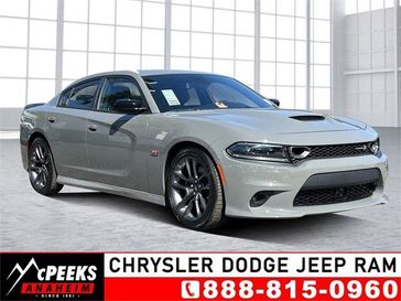 2023 Dodge Charger Scat Pack in a Destroyer Gray exterior color and Blackinterior. McPeek's Chrysler Dodge Jeep Ram of Anaheim 888-861-6929 mcpeeksdodgeanaheim.com 