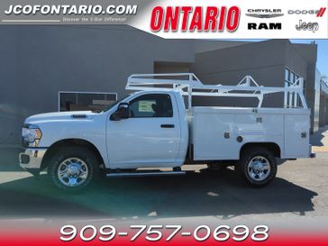 2024 RAM 2500 Tradesman in a Bright White Clear Coat exterior color and Diesel Gray/Blackinterior. Ontario Auto Center ontarioautocenter.com 