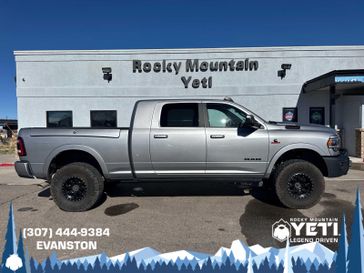 2021 RAM 3500 Laramie 4x4 Mega Cab 64 Box in a SILVER exterior color. Rocky Mountain Yeti Jackson Hole 307-733-5337 rockymountainyetijacksonhole.com 