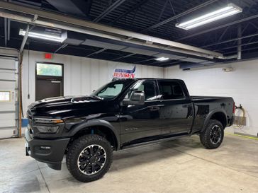 New 2026 RAM 2500 Rebel Crew Cab 4x4 6'4' Box in a Diamond Black Crystal Pearl Coat exterior color and Blackinterior. Jensen Chrysler Dodge Jeep Ram 507-354-0542 jensenchryslerdodgejeepram.com 