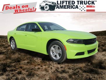 2023 Dodge Charger SXT in a Sublime Metallic Clear Coat exterior color and Blackinterior. Lifted Truck America 888-267-0644 liftedtruckamerica.com 