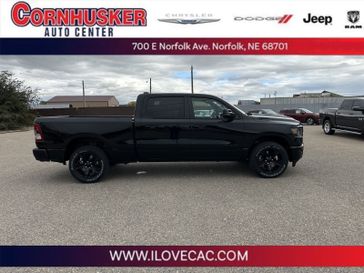 2024 RAM 1500 Big Horn Crew Cab 4x4 6'4' Box in a Diamond Black Crystal Pearl Coat exterior color and Blackinterior. Cornhusker Auto Center 402-866-8665 cornhuskerautocenter.com 