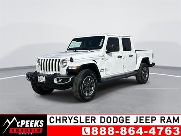 2022 Jeep Gladiator Overland in a Bright White Clear Coat exterior color and Blackinterior. McPeek's Chrysler Dodge Jeep Ram of Anaheim 888-861-6929 mcpeeksdodgeanaheim.com 