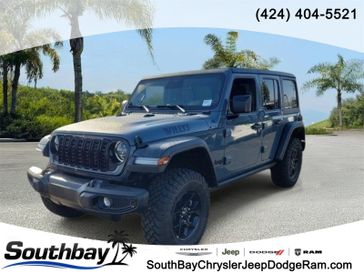 New 2026 Jeep Wrangler Willys in a Gray exterior color and Blackinterior. Southbay Chrysler Jeep Dodge Ram (424) 404-5521 pixelmotiondemo.com 