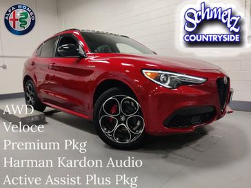 2023 Alfa Romeo Stelvio Veloce Q4 AWD w/Prem & Activ Pkg in a Rosso Etna exterior color and Black Heated Sport Leatherinterior. Schmelz Countryside Alfa Romeo (651) 867-3222 schmelzalfaromeo.com 