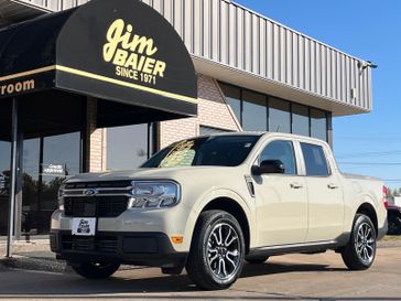 2024 Ford Maverick Lariat in a TERRAIN exterior color and DESERT BROWNinterior. Jim Baier Inc 319-372-1012 jimbaier.com 