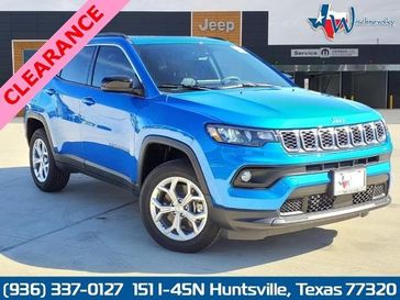 2024 Jeep Compass Latitude 4x4 in a Laser Blue Pearl Coat exterior color. Wischnewsky Dodge 936-755-5310 wischnewskydodge.com 