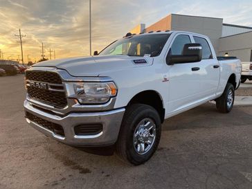 2024 RAM 2500 Tradesman Crew Cab 4x4 6'4' Box in a Bright White Clear Coat exterior color and Blackinterior. Legacy Auto Center 620-315-9264 legacyautocenter.net 