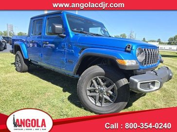 2024 Jeep Gladiator Sport S 4x4 in a Hydro Blue Pearl Coat exterior color. Cornhusker Auto Center 402-866-8665 cornhuskerautocenter.com 