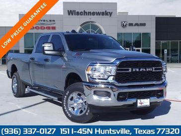 2024 RAM 2500 Tradesman Crew Cab 4x4 8' Box in a Billet Silver Metallic Clear Coat exterior color and Blackinterior. Wischnewsky Dodge 936-755-5310 wischnewskydodge.com 