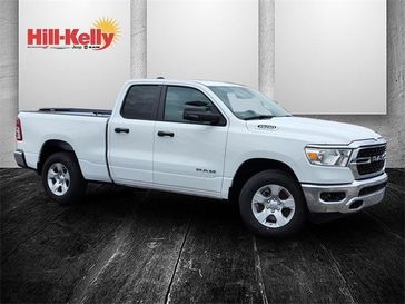 2023 RAM 1500 Big Horn Quad Cab 4x4 6'4' Box in a Bright White Clear Coat exterior color and Diesel Gray/Blackinterior. Hill-Kelly Dodge (850) 786-2130 hillkellydodge.com 