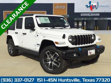 2024 Jeep Wrangler 4-door Sport S 4xe in a Bright White Clear Coat exterior color and Blackinterior. Wischnewsky Dodge 936-755-5310 wischnewskydodge.com 