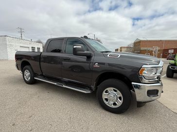 2024 RAM 2500 Tradesman Crew Cab 4x4 6'4' Box in a Granite Crystal Metallic Clear Coat exterior color. Hometown Motors of Rockwell City 712-220-7644 hometownmotorsrc.com 