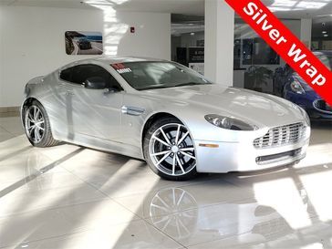 2010 Aston Martin Vantage Base in a Fire Red exterior color and Obsidian Blackinterior. Glenview Luxury Imports 847-904-1233 glenviewluxuryimports.com 