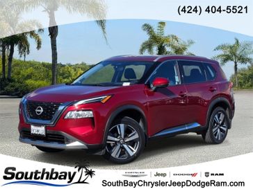 Used 2022 Nissan Rogue FWD Platinum in a Scarlet Ember Tint Coat exterior color and Charcoalinterior. Southbay Chrysler Jeep Dodge Ram (424) 404-5521 pixelmotiondemo.com 