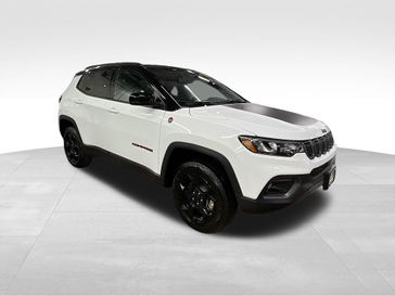 2024 Jeep Compass Trailhawk 4x4 in a Bright White Clear Coat exterior color and Ruby Red/Blackinterior. Sheridan Motors Auto (307) 218-2217 sheridanmotors.com 