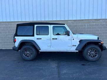 2024 Jeep Wrangler 4-door Sport S in a Bright White Clear Coat exterior color and Blackinterior. Wilmington Auto Center Chrysler Dodge Jeep Ram (937) 556-6430 wilmingtonautocentercdjr.com 