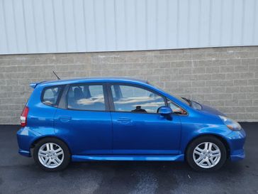 2008 Honda Fit Sport in a Vivid Blue Pearl exterior color and Blackinterior. Wilmington Auto Center Chrysler Dodge Jeep Ram (937) 556-6430 wilmingtonautocentercdjr.com 