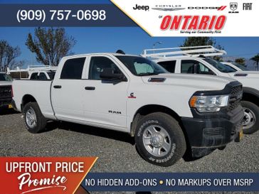 2019 RAM 2500 Tradesman in a Bright White Clear Coat exterior color and Diesel Gray/Blackinterior. Ontario Auto Center ontarioautocenter.com 