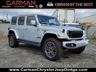 2024 Jeep Wrangler 4-door High Altitude 4xe in a Silver Zynith Clear Coat exterior color and Black - KLX9interior. Carman Chrysler Jeep Dodge Ram 302-317-2378 carmanchryslerjeepdodge.com 