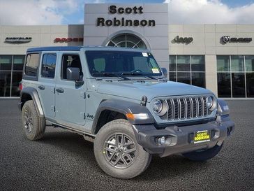 New 2026 Jeep Wrangler Sport in a Gray exterior color and Blackinterior. Southbay Chrysler Jeep Dodge Ram (424) 404-5521 pixelmotiondemo.com 