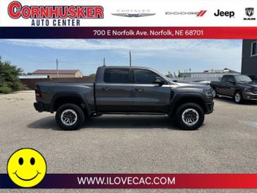 2021 RAM 1500 TRX in a Granite Crystal Metallic Clear Coat exterior color and Blackinterior. Cornhusker Auto Center 402-866-8665 cornhuskerautocenter.com 