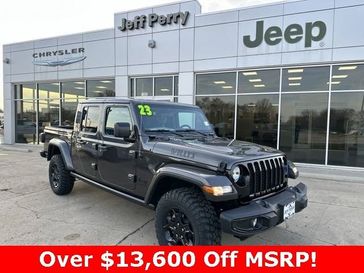 2023 Jeep Gladiator Willys 4x4 in a Granite Crystal Metallic Clear Coat exterior color and Blackinterior. Jeff Perry Chrysler Jeep 815-859-8394 jeffperrychryslerjeep.com 