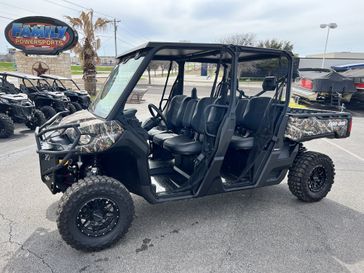 2024 CAN-AM DEFENDER MAX XT HD9 WILDLAND CAMO in a CAMO exterior color. Family PowerSports (877) 886-1997 familypowersports.com 