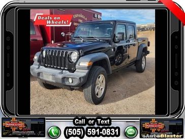 2020 Jeep Gladiator Sport in a Black Clear Coat exterior color and Blackinterior. Melloy Dodge RAM FIAT 505-588-4459 melloydodge.com 