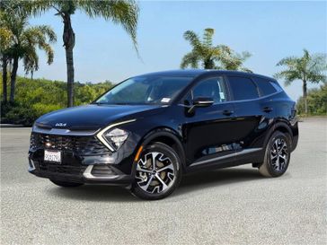 Used 2023 Kia Sportage EX FWD in a Ebony Black exterior color and Blackinterior. Southbay Chrysler Jeep Dodge Ram (424) 404-5521 pixelmotiondemo.com 