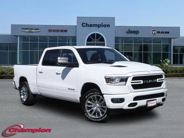 2024 RAM 1500 Laramie Crew Cab 4x4 6'4' Box in a Bright White Clear Coat exterior color and LEATHER TRIMinterior. Champion Chrysler Jeep Dodge Ram 800-549-1084 pixelmotiondemo.com 