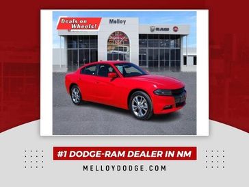 2022 Dodge Charger SXT in a Torred Clear Coat exterior color and Blackinterior. Melloy Dodge RAM FIAT 505-588-4459 melloydodge.com 