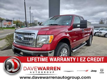2013 Ford F-150 XLT 4WD SuperCab 145 in a Ruby Red Metallic Tinted Clear Coat exterior color and Steel Grayinterior. Dave Warren Chrysler Dodge Jeep Ram (716) 708-1207 davewarrenchryslerdodgejeepram.com 