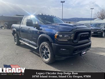 2023 RAM 2500 Rebel Crew Cab 4x4 6'4' Box in a Patriot Blue Pearl Coat exterior color. Legacy Chrysler Jeep Dodge RAM 541-663-4885 legacychryslerjeepdodgeram.com 